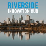 Riverside Innovation Hub over Mississippi River and City skyline